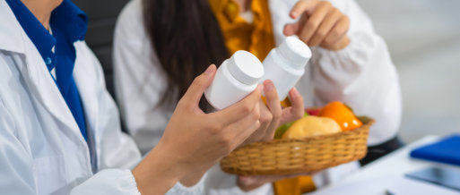 two person holding bottle